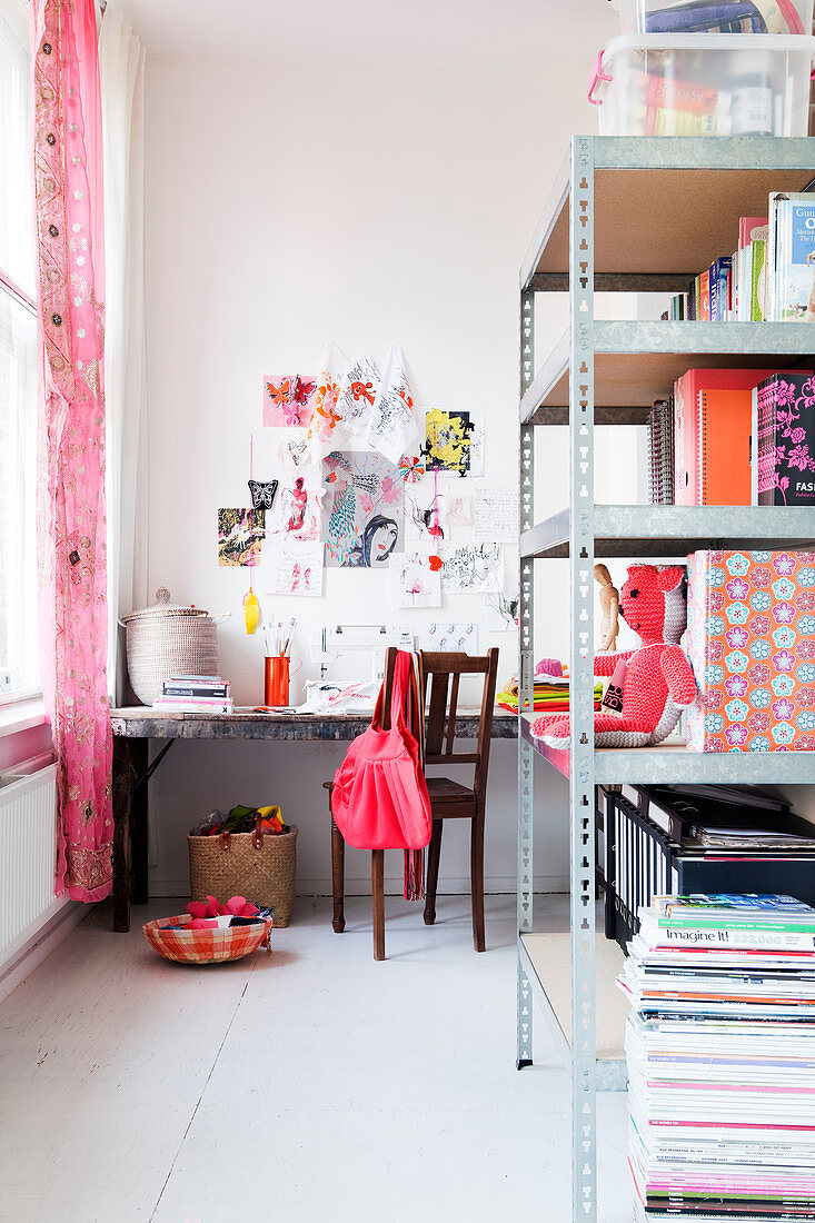 Full metal shelf and table with sewing machine in the study