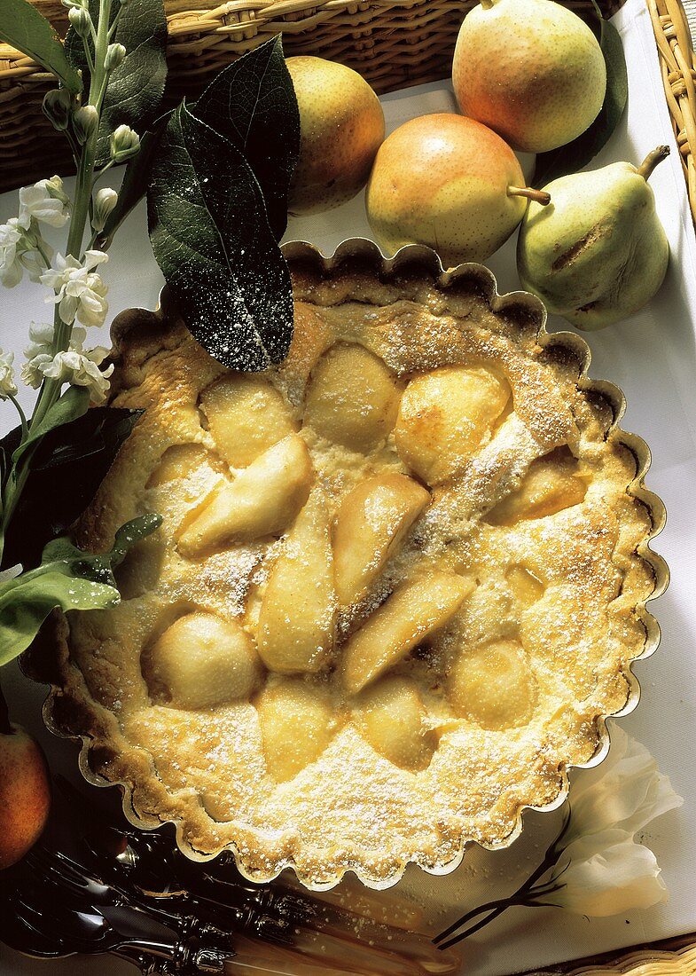 Sunken pear cake in the baking tin