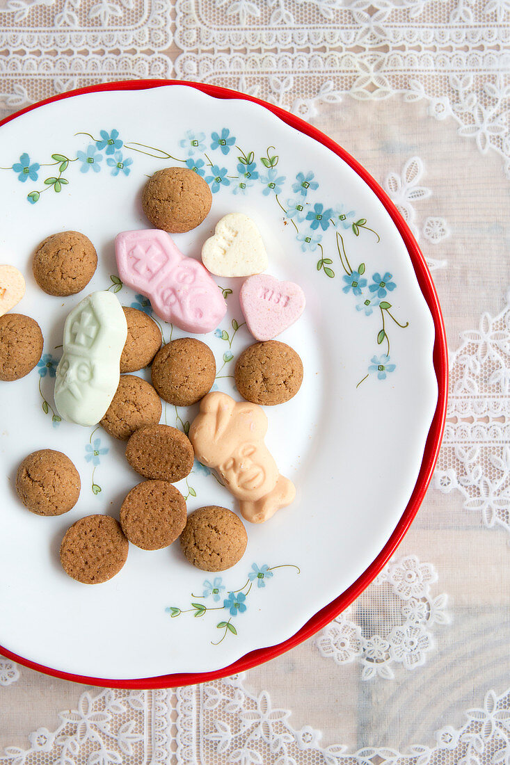 Gingersnaps and Christmas sweets on a plate