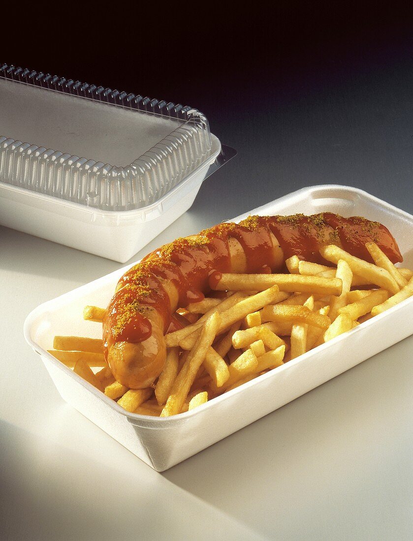 Currywurst with French Fries in 'To Go' Container
