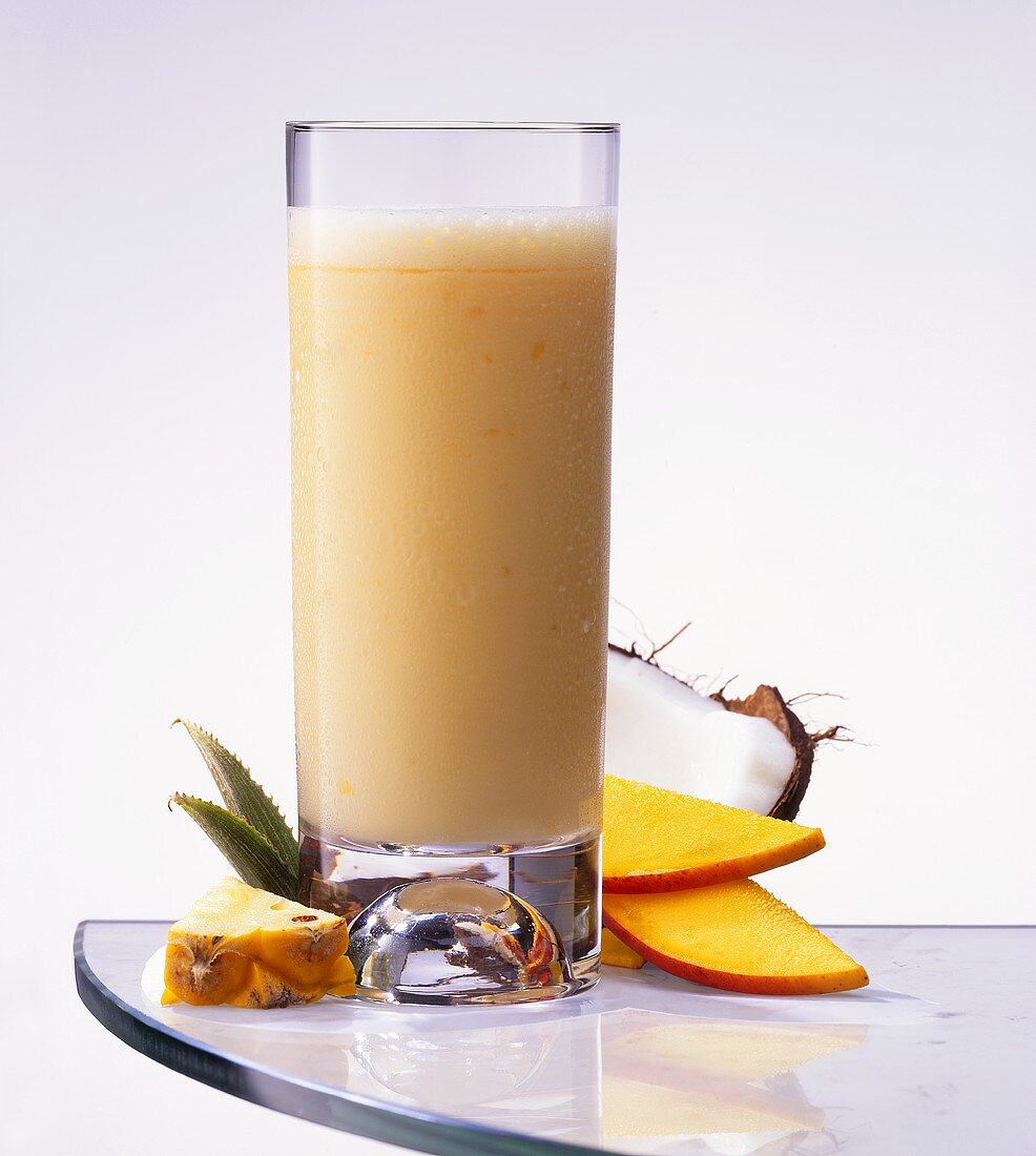 Exotic fruit milk shake with pineapple, mango & coconut