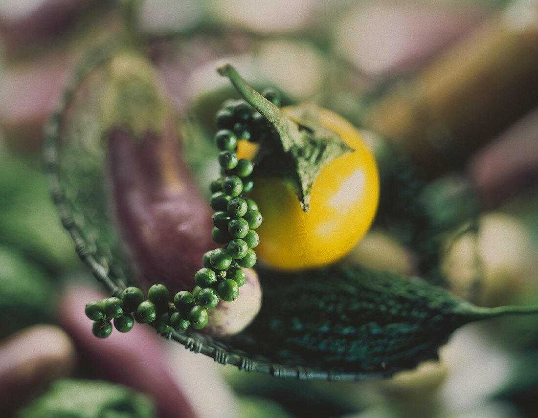 Green Peppercorns on a Yellow Eggplant