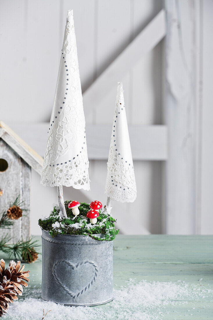 Christmas trees made from paper doilies