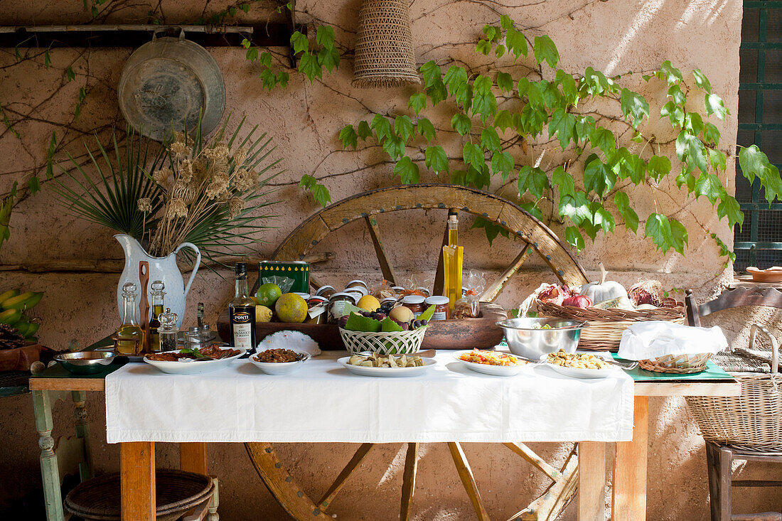 Antipasti and fruit bowl on a Mediterranean table