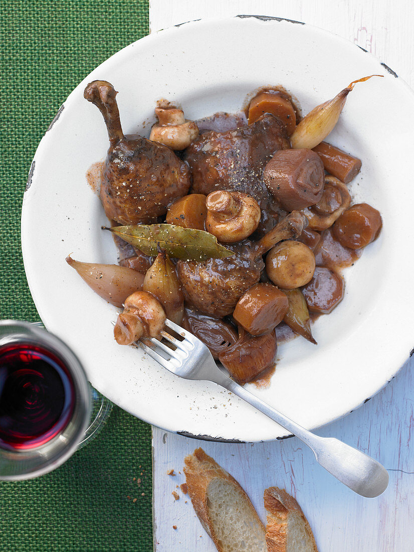 Coq Au Vin with shallots and mushrooms
