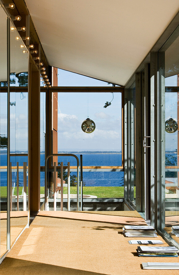 Modern hallway with window front and sea view