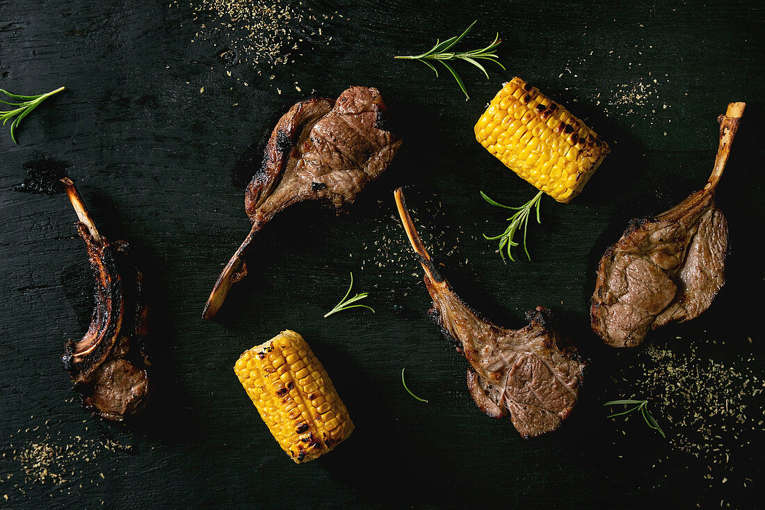 Grilled bbq rack of lamb with sweet corn cobs and rosemary