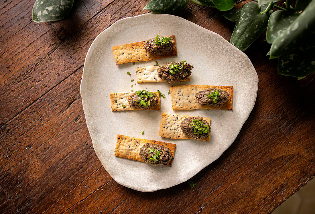 Sesame crackers with tapenade