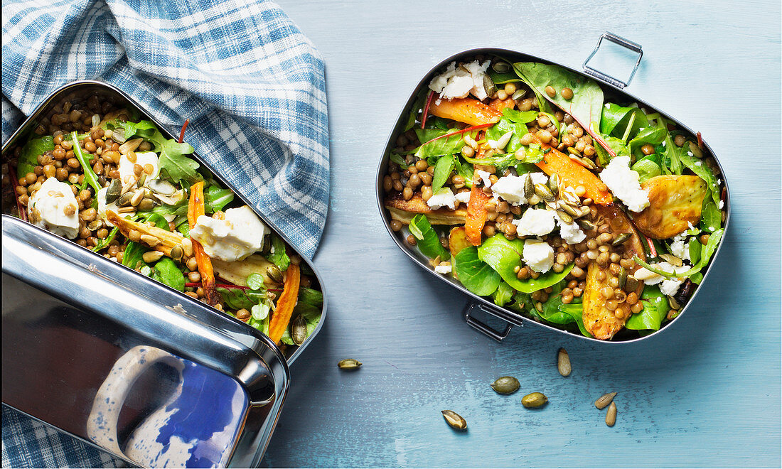 Vegetable salad with lentils, pumpkin and feta in a lunch box