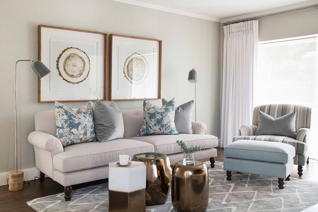 Classic living room in shades of grey with bronze accents