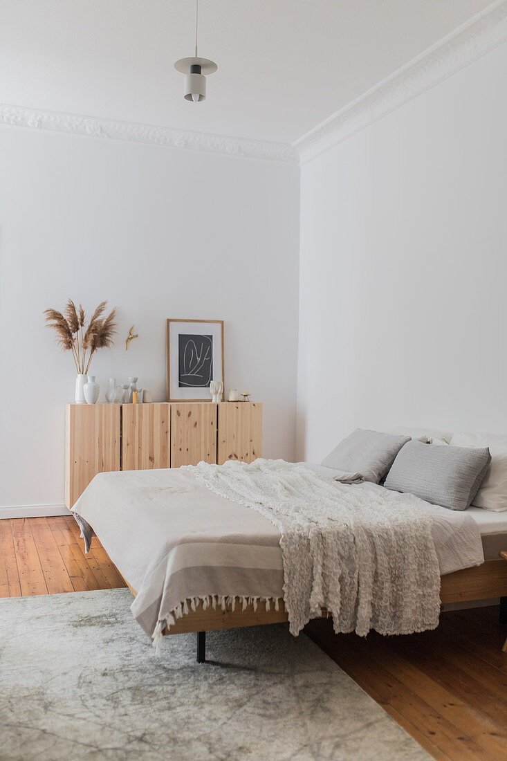 Minimalist bedroom in natural shades