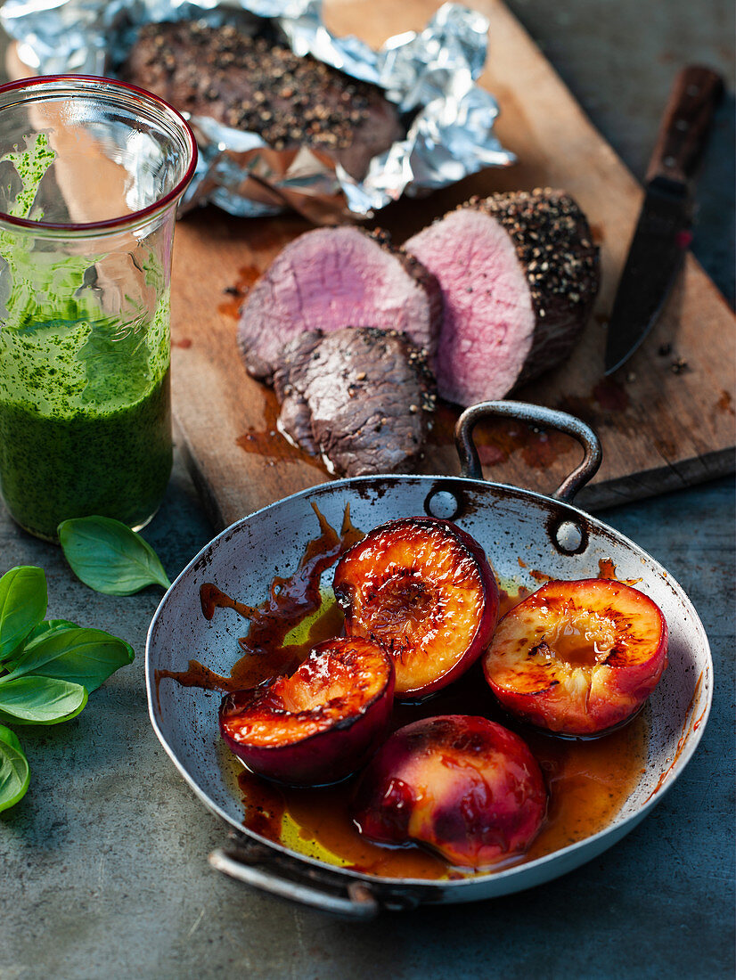 Deer leg with caramelized peaches