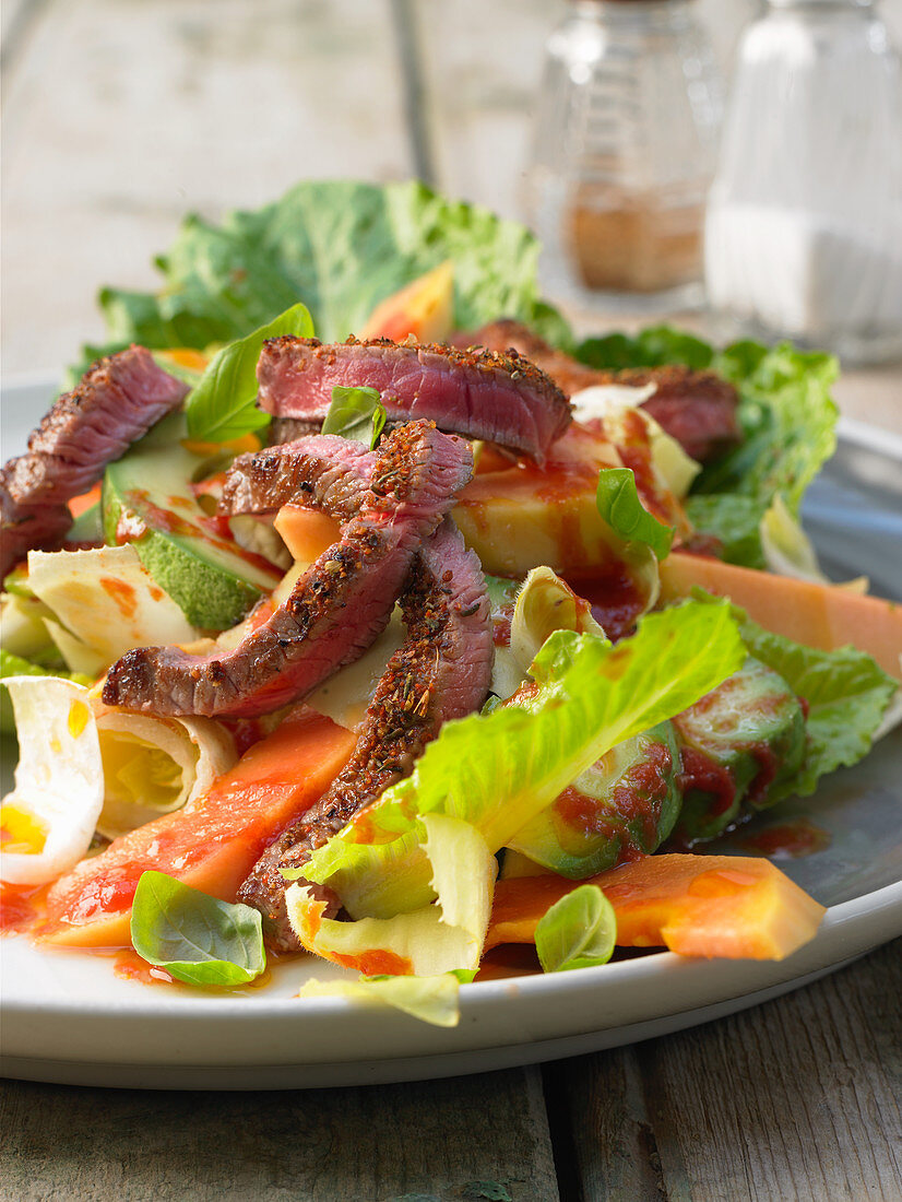 Papaya salad with beef steak