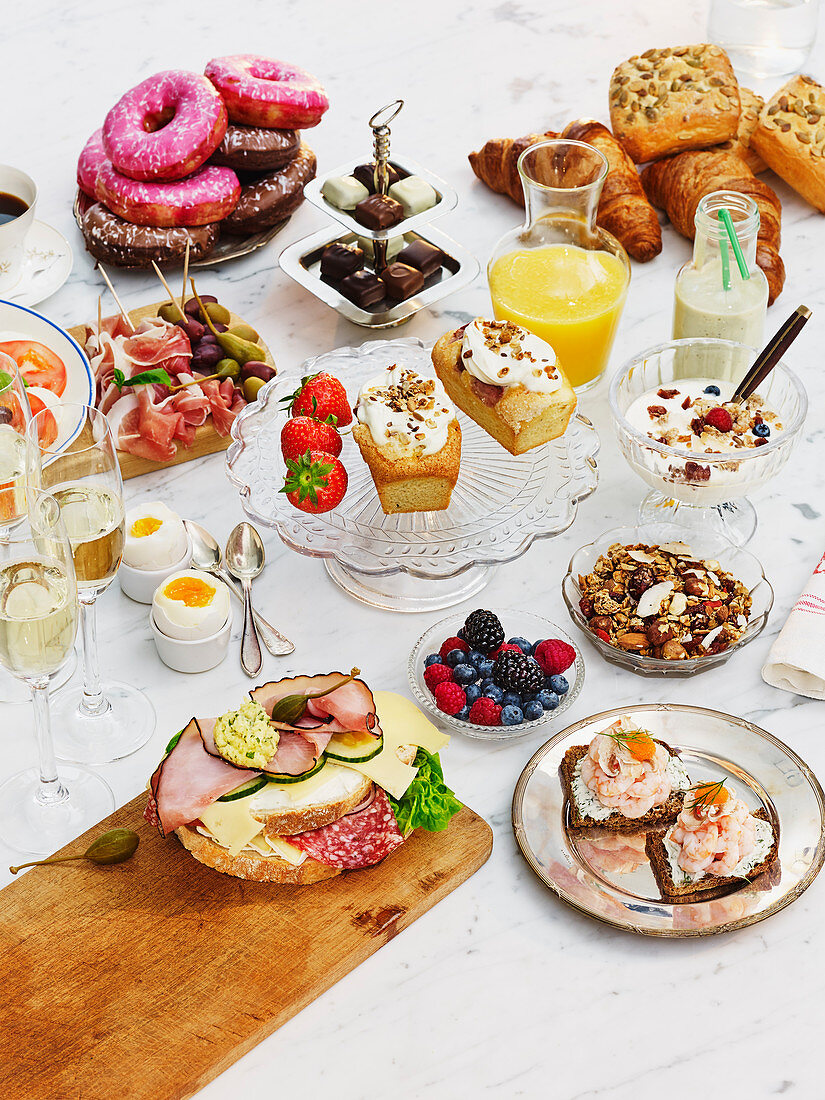 A brunch buffet featuring sweet and savoury dishes