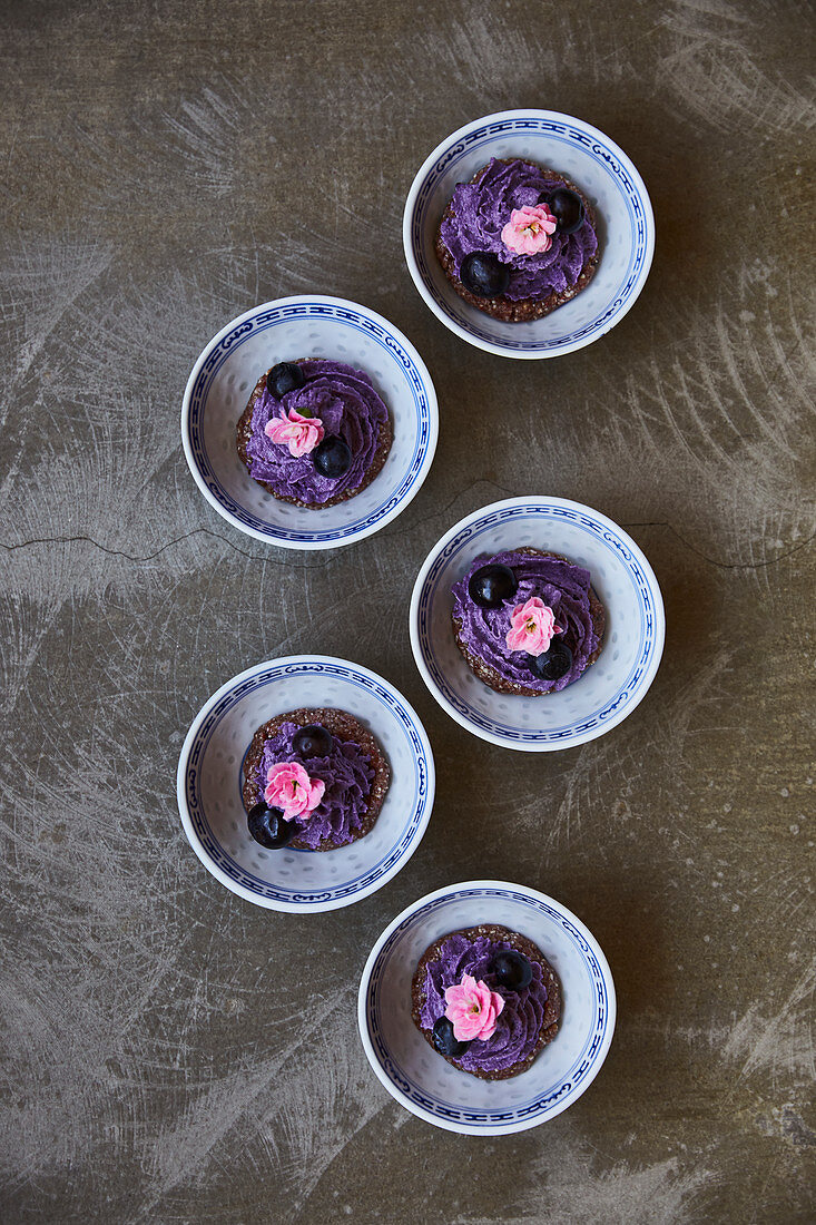 Blueberry desserts with edible flowers