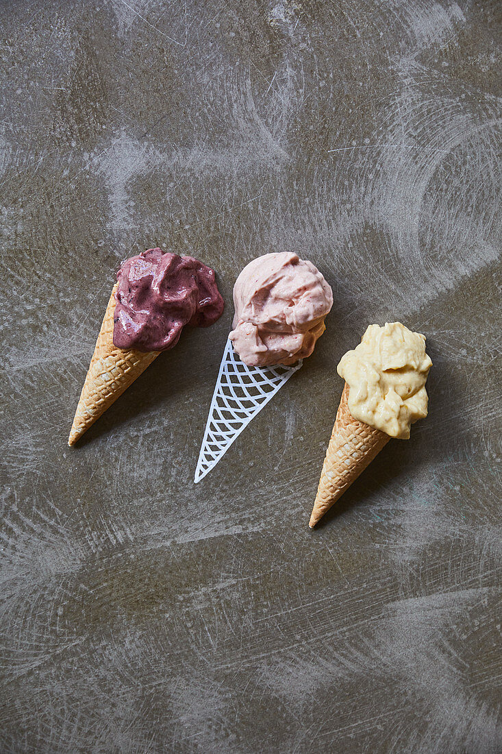 Three ice cream cones, one drawn