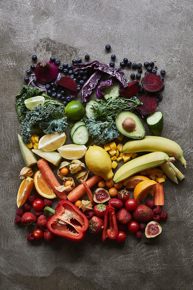 Colourful fruit and vegetable arrange in a rainbow
