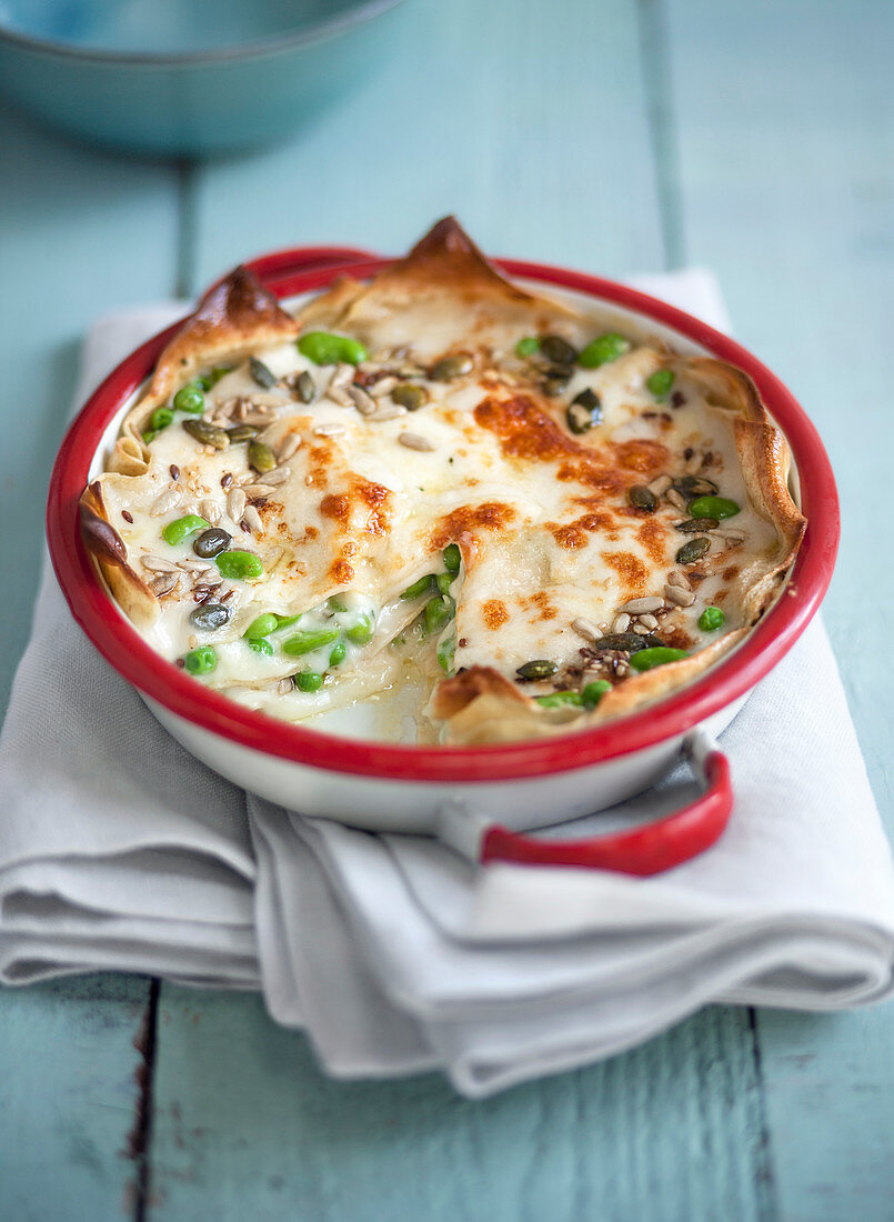 Lasagne mit Erbsen, Edamame und gerösteten Samen