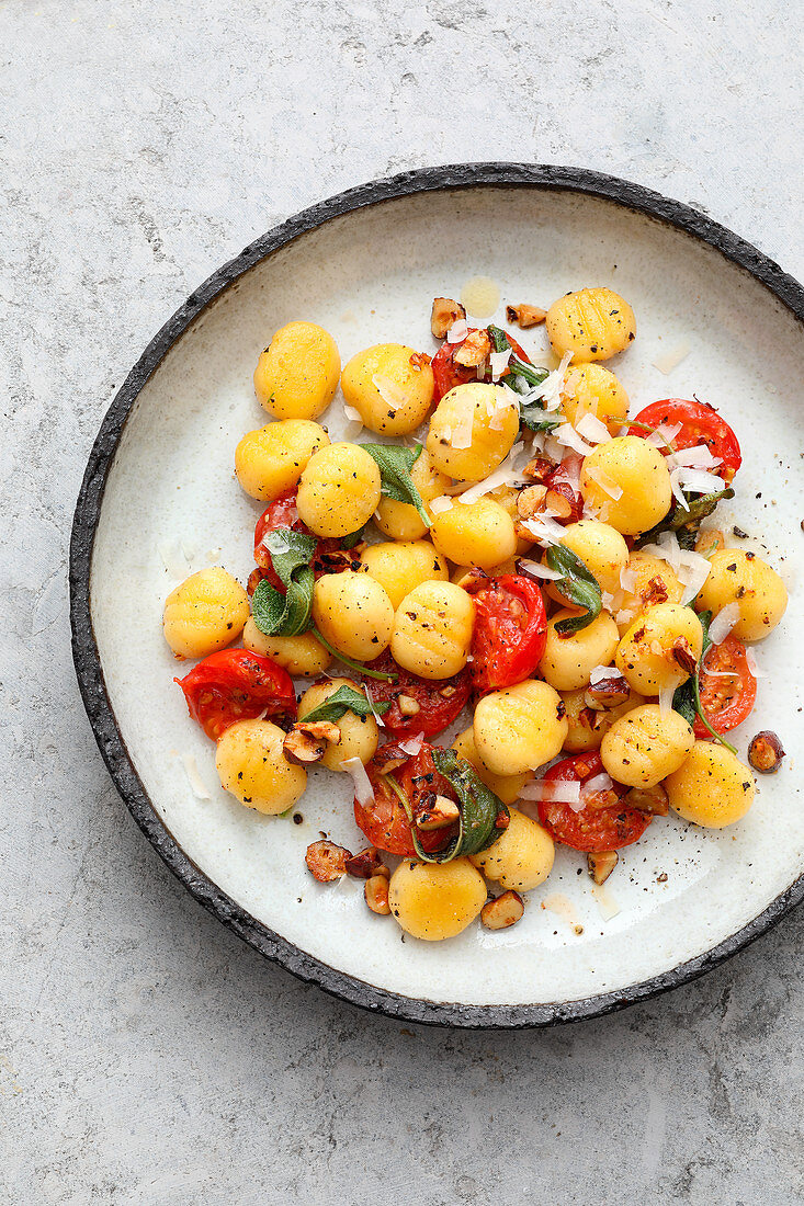 Gnocchi with cherry tomatoes and hazelnuts