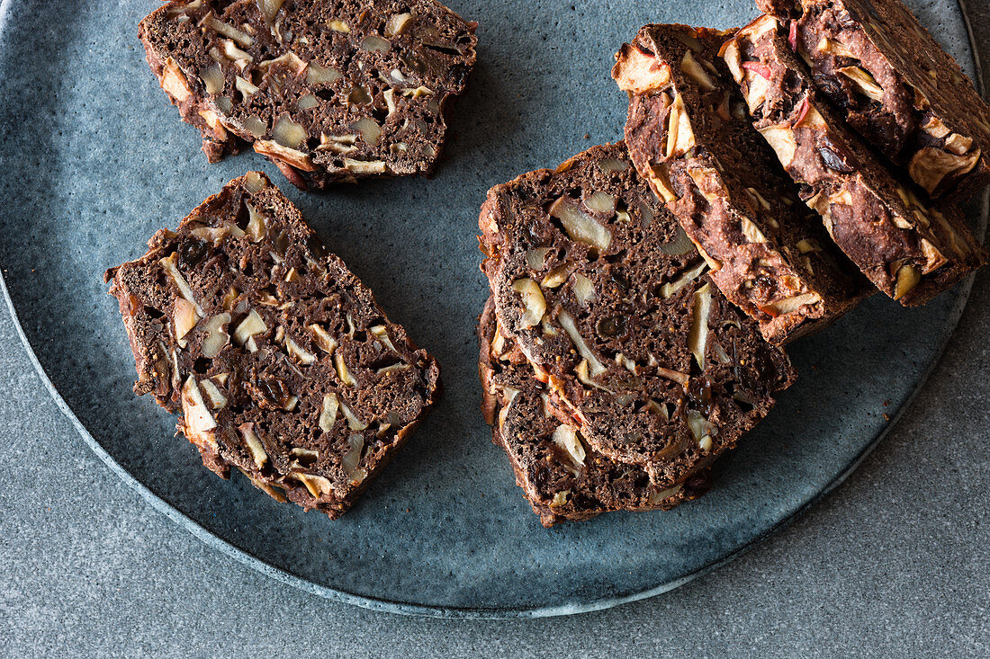 Apple bread with dried fruits, walnuts, cocoa powder and cinnamon