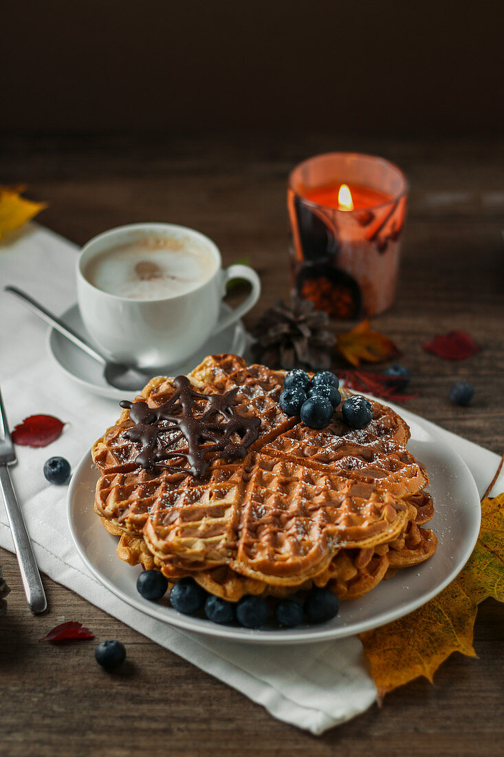 Autumnal halloween waffles with blueberries
