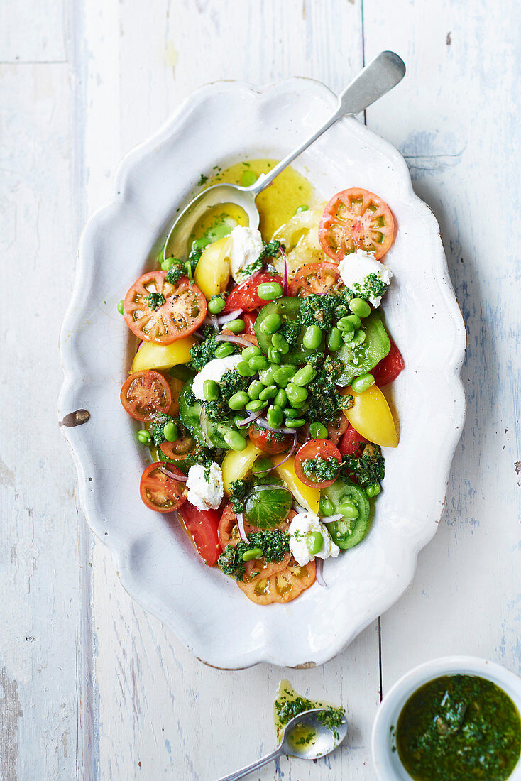 Heritage tomato salad with ricotta, broad beans and salsa verde