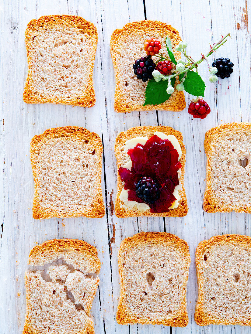 Melba toast with and without blackberry jelly