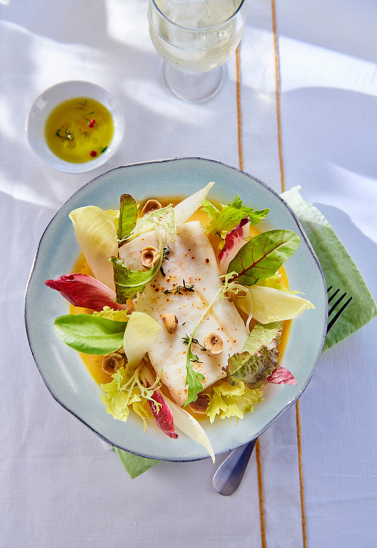 Perch fillet with mixed leaf salad