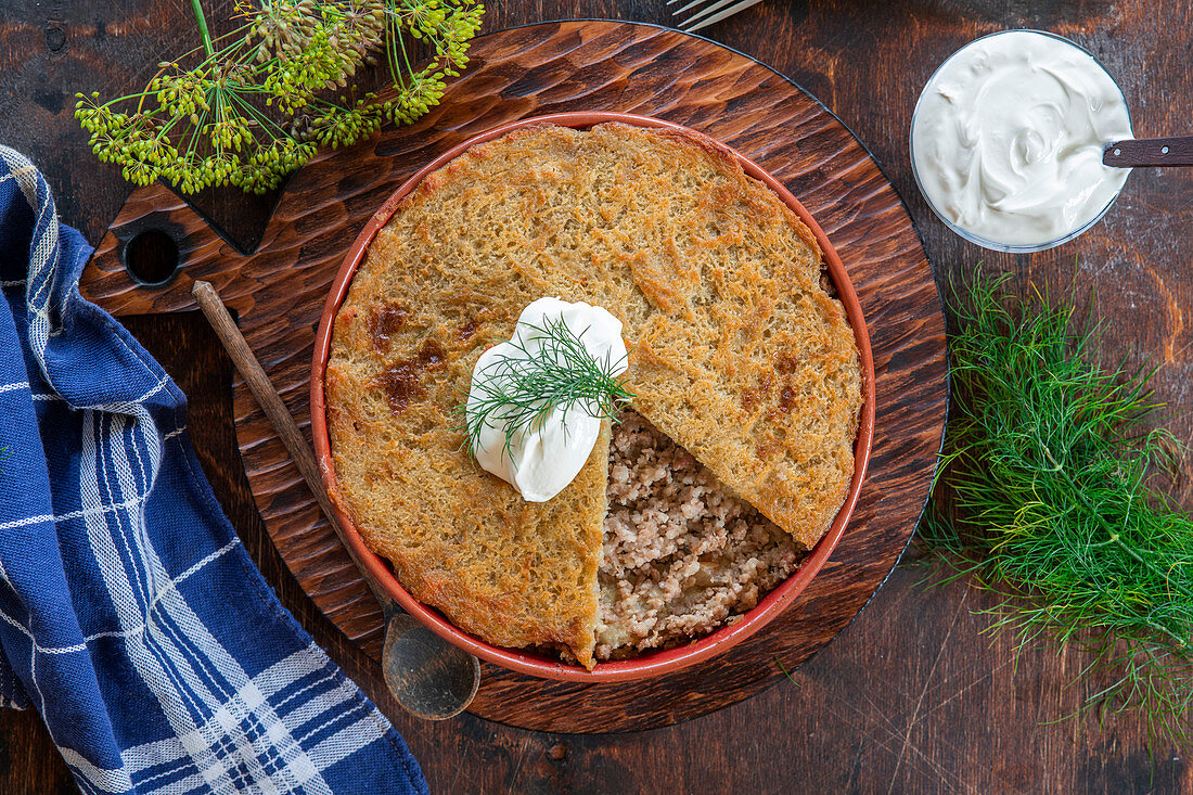 Babka - Belarussian dish made with mashed raw potato puree (like draniki) and minced meat fillling