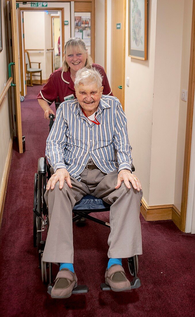 Care home resident and assistant