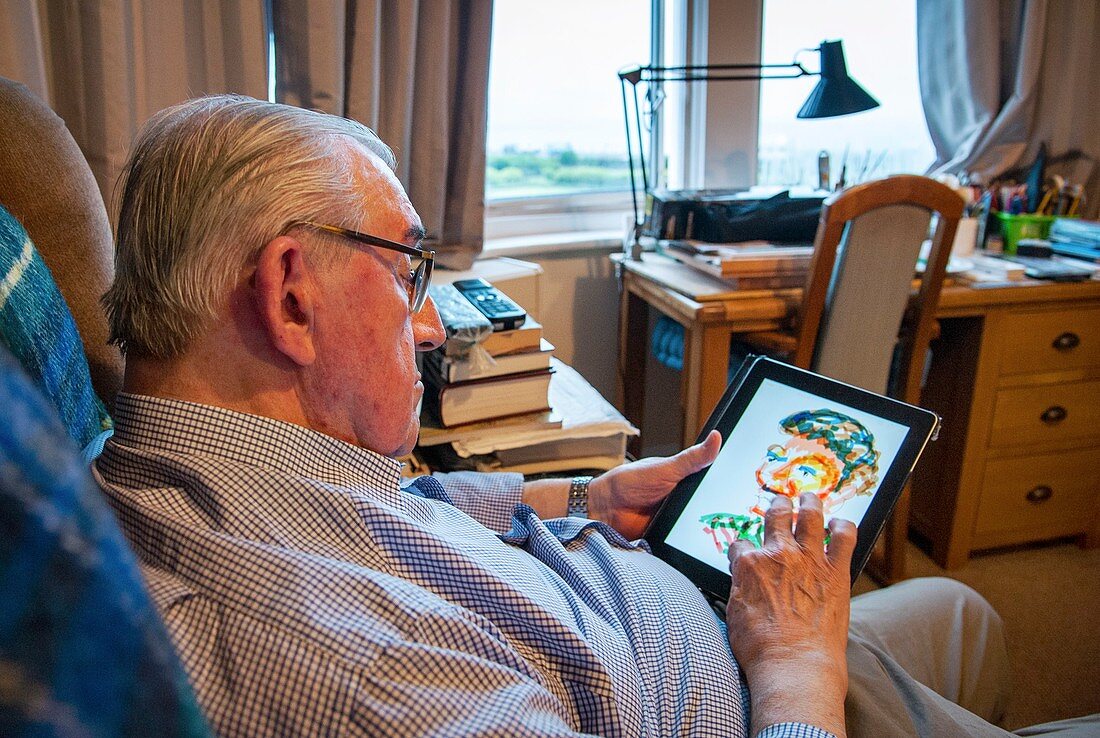 Care home resident drawing digital portrait