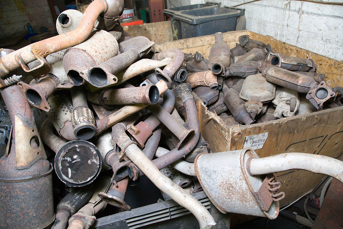 Pile of catalytic converters at a metal recycling centre