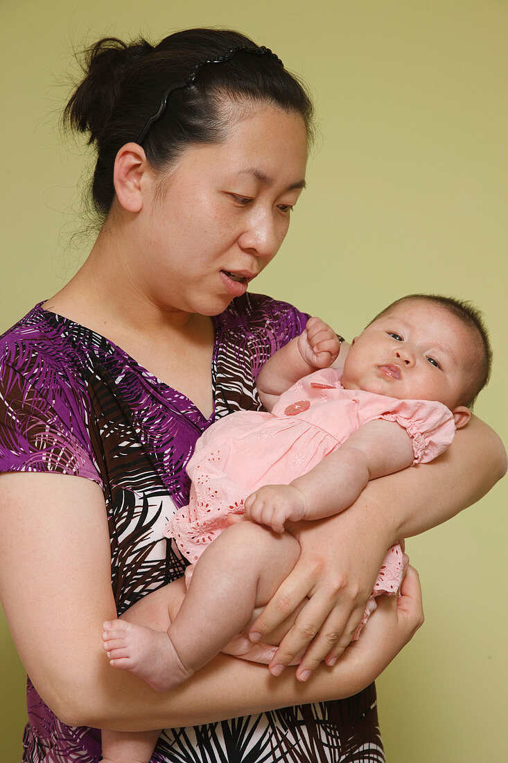 Chinese mother with baby