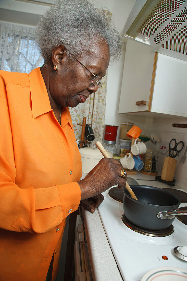 Elderly woman in kitchen