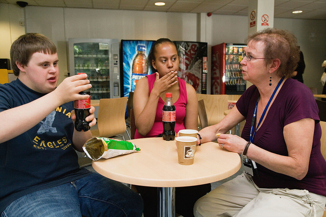 Students with learning disabilities and staff taking a break