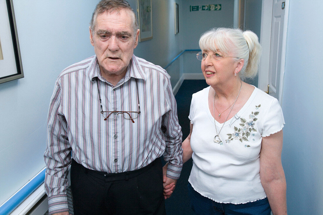 Woman who is visiting her husband with Alzheimer's Disease