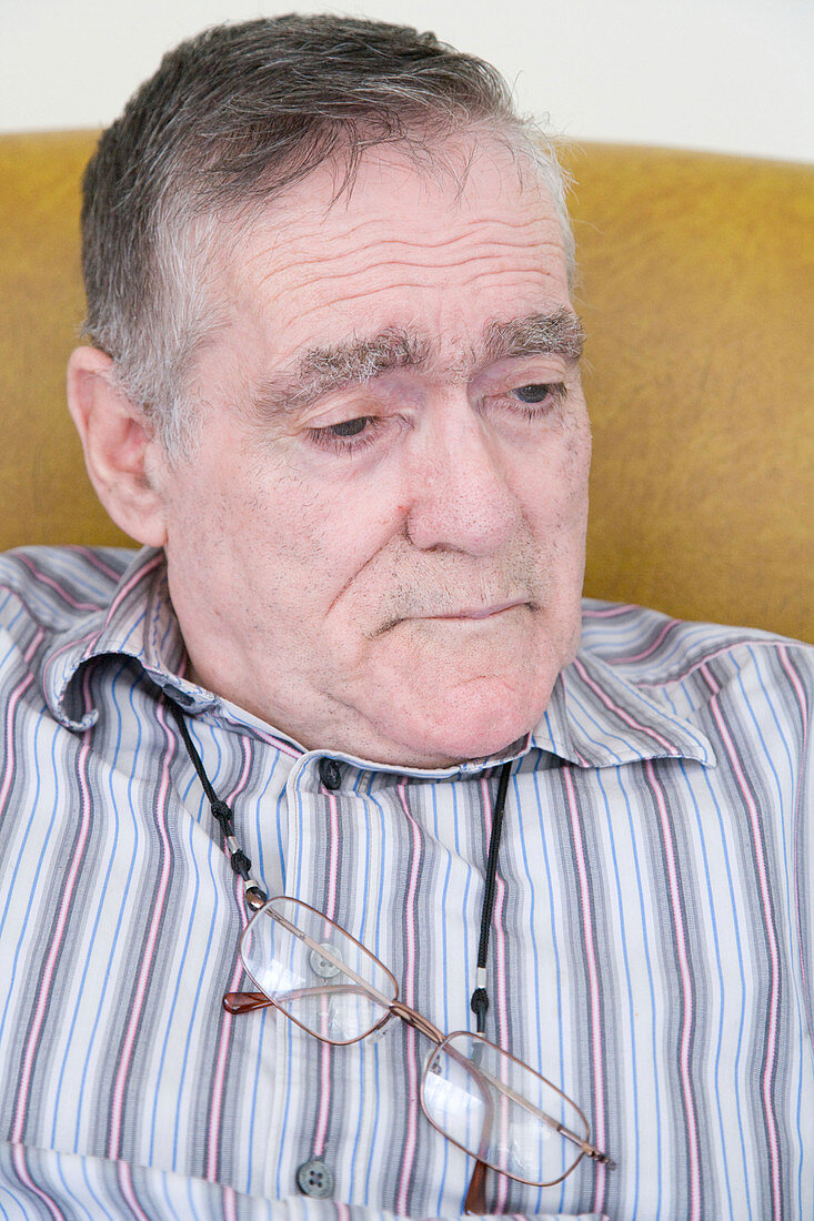 Man with Alzheimer's Disease looking thoughtful