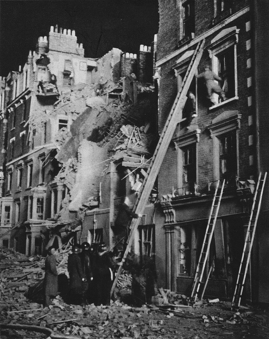 Rescue men at work, searching, helping to safety, 1941