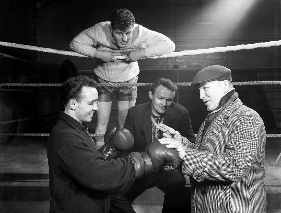 A miner gets some ringside boxing advise, Newcastle, 1964