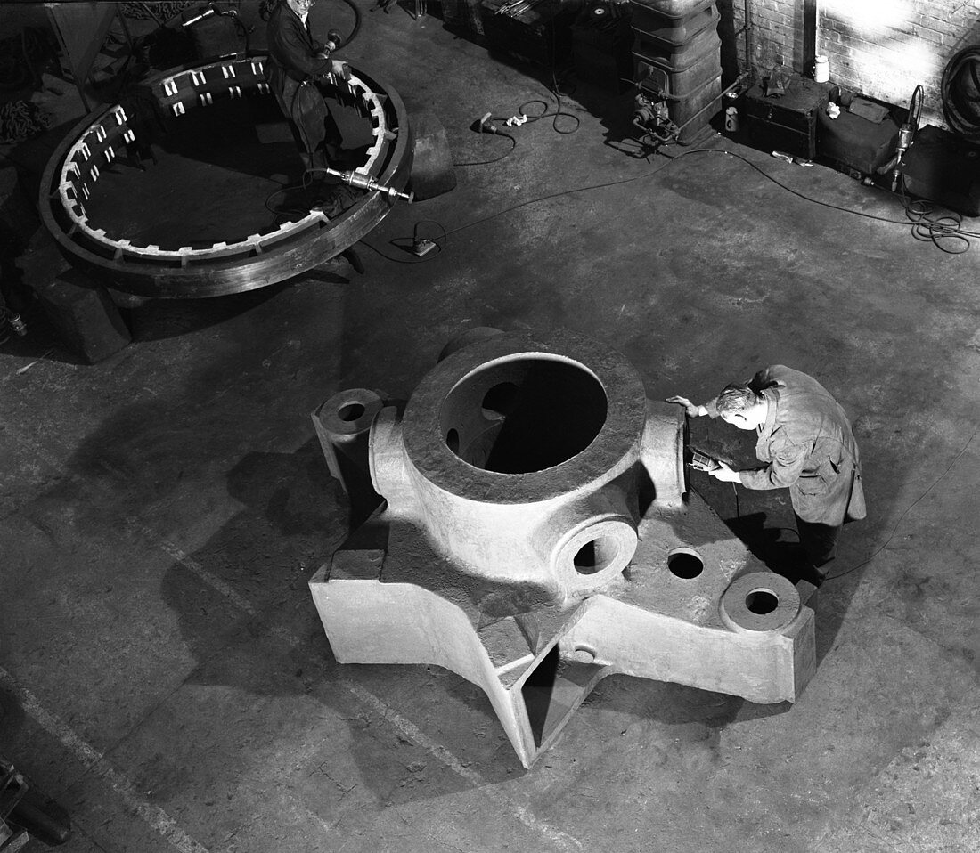 Inspecting a large precision steel casting, 1961