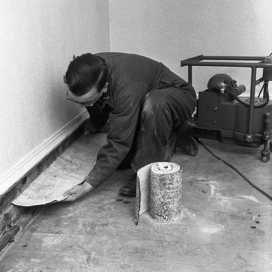 Installing a damp proof course in a house, 1957
