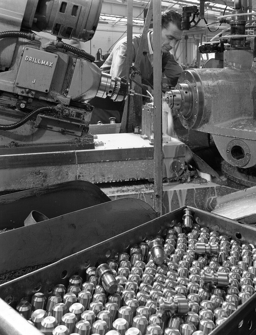 Working on a Drillmax machine, 1964