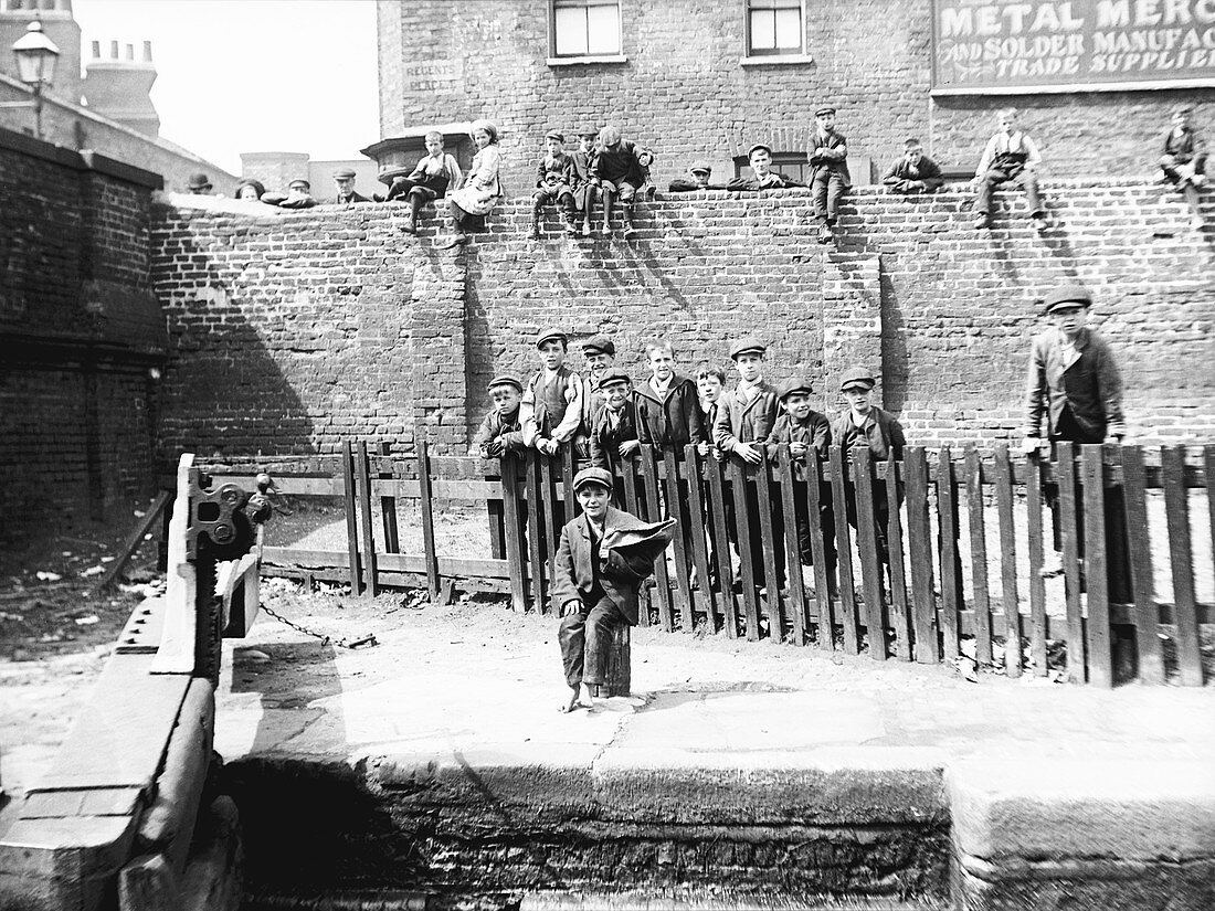 Boys by a lock on the Grand Union Canal, London, c1905