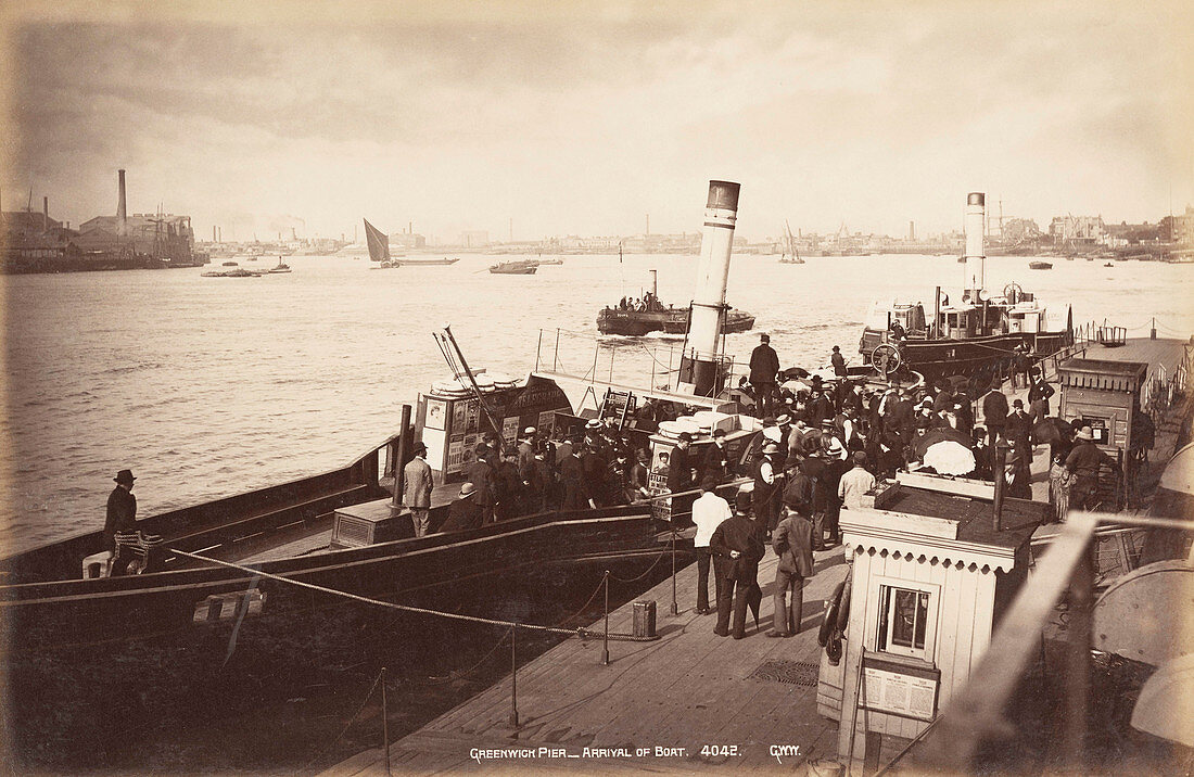 Paddle steamer disembarking passengers, c1890
