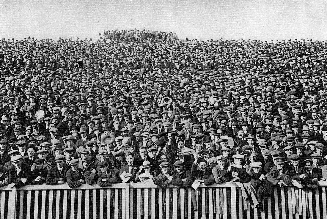 A Saturday winter football crowd, London, 1926-1927