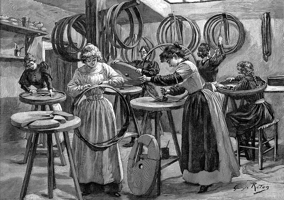 Women making pneumatic tyres for bicycles, France, 1896