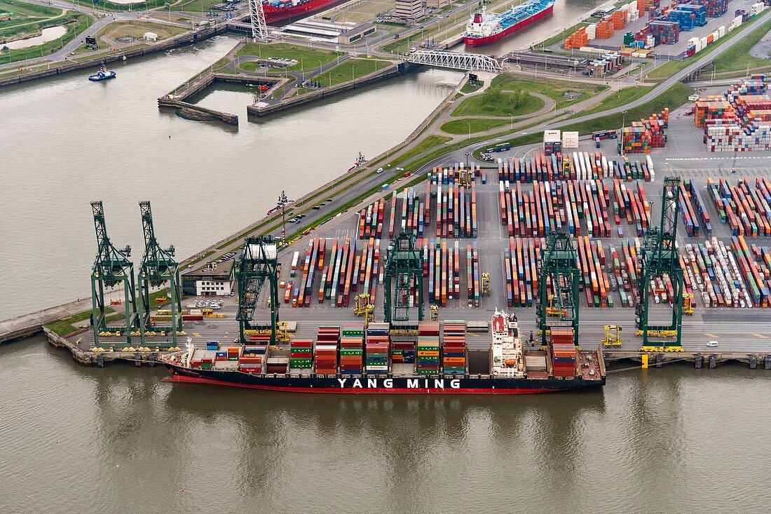 Barge loading shipping containers, aerial photograph