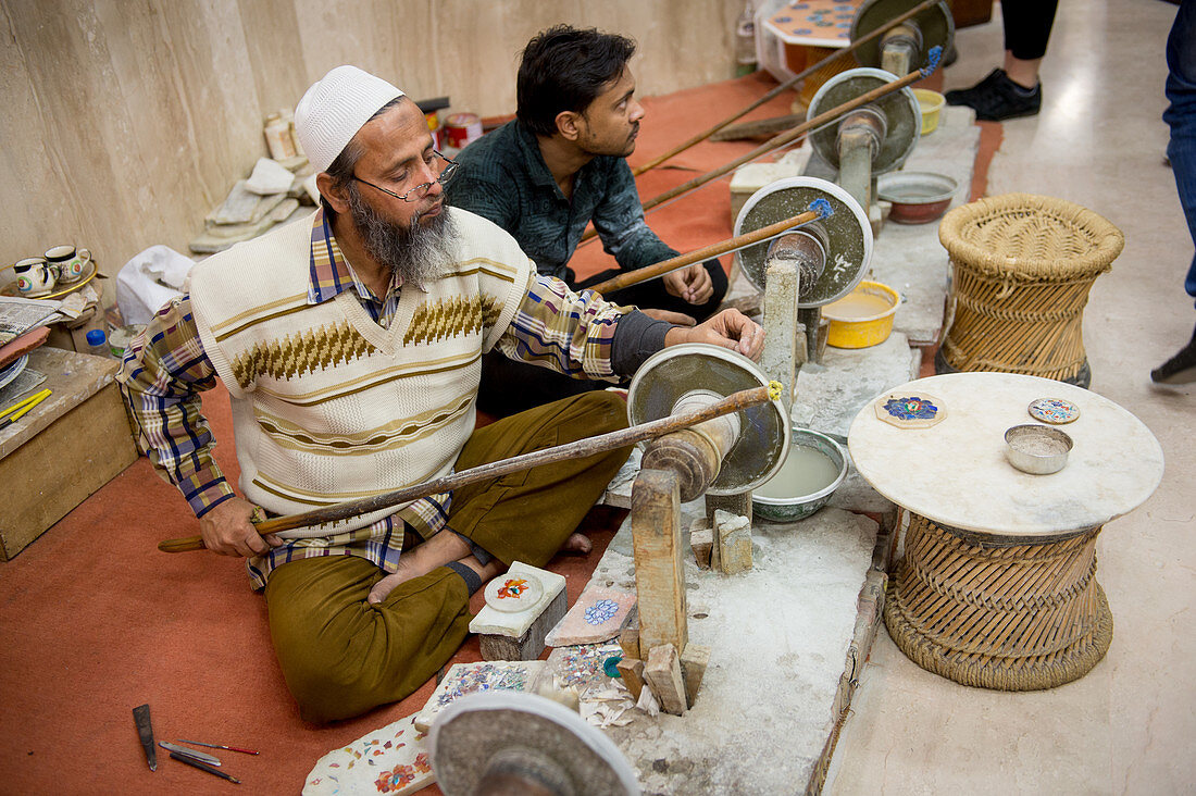 Workers carving marble inlay, Agra, India