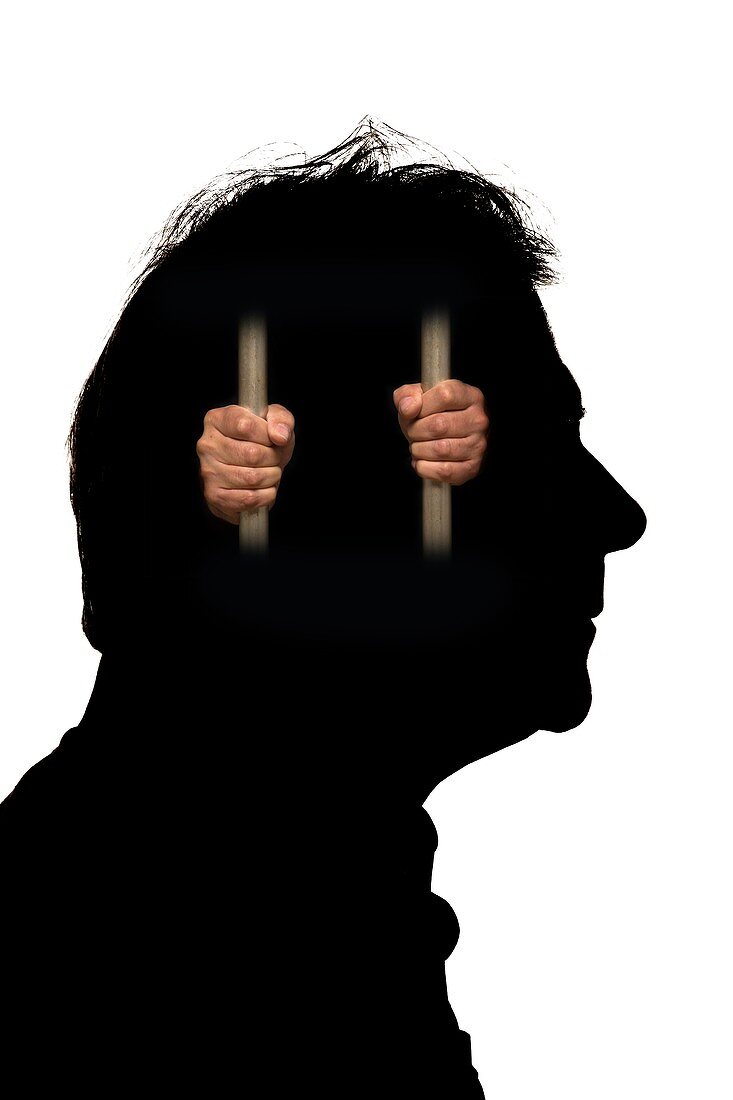 Man's head with person trapped behind bars