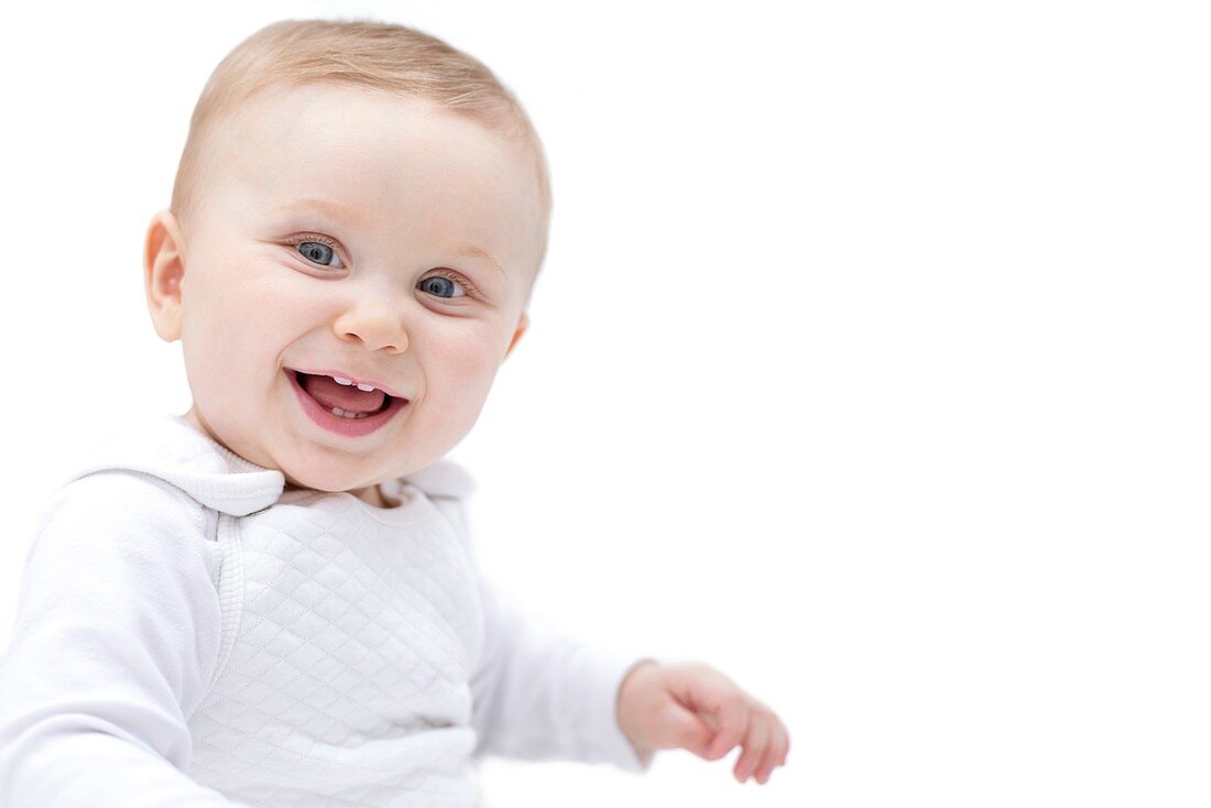 Baby smiling towards camera, portrait